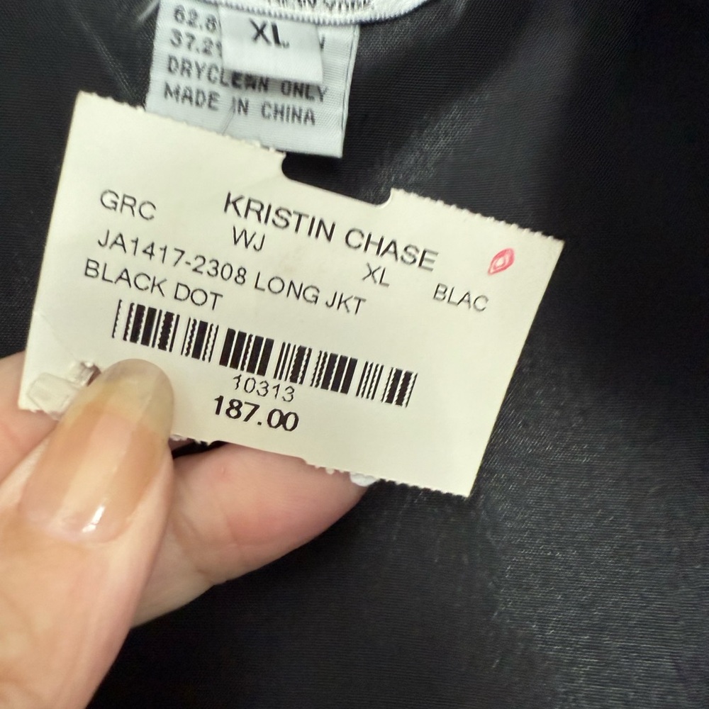 Grace Chuang black edge to edge jacket